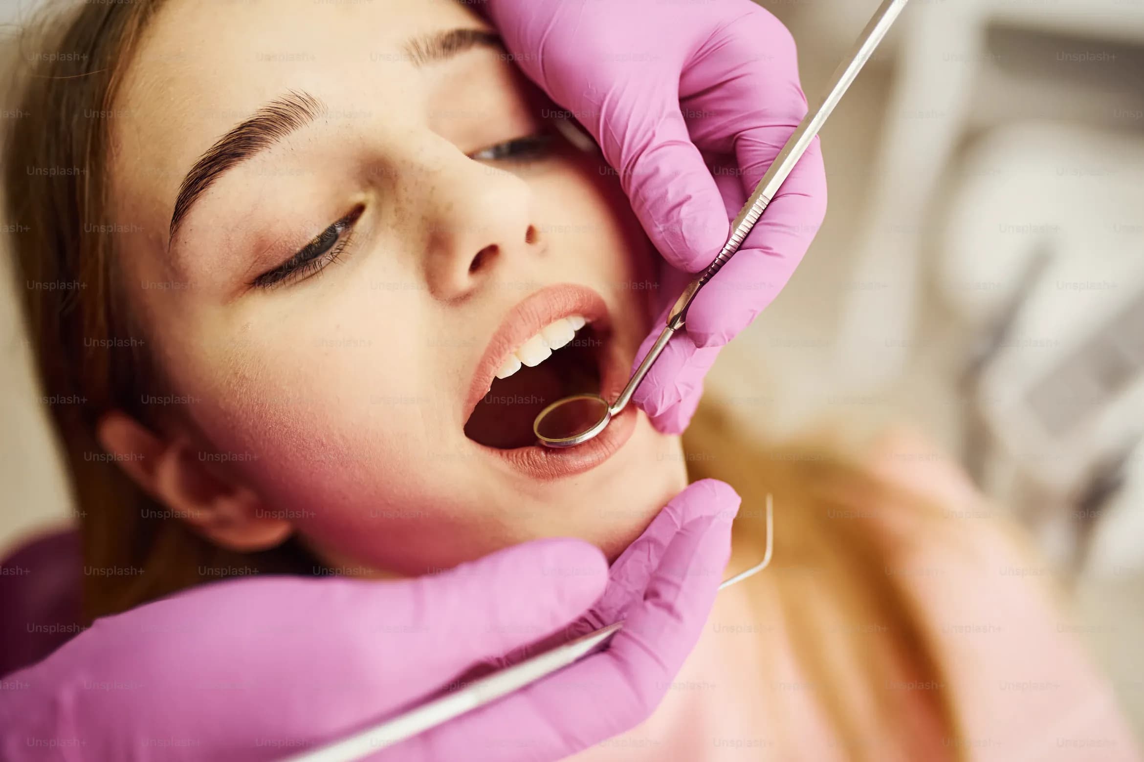 Dr. Radhika checking teeth at Spectrum Dental Clinic